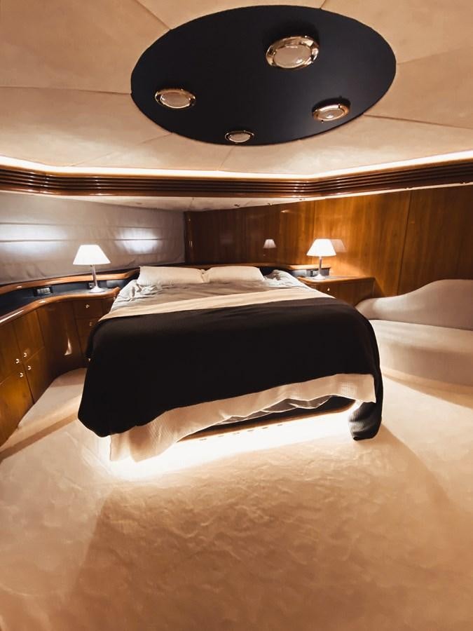 a room with two beds aboard HELENA Yacht for Sale