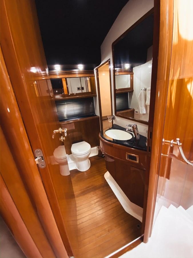 a bathroom with a sink and a toilet aboard HELENA Yacht for Sale