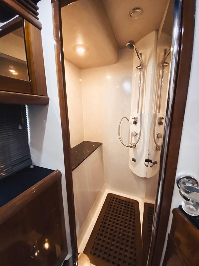 a bathroom with a shower and a sink aboard HELENA Yacht for Sale