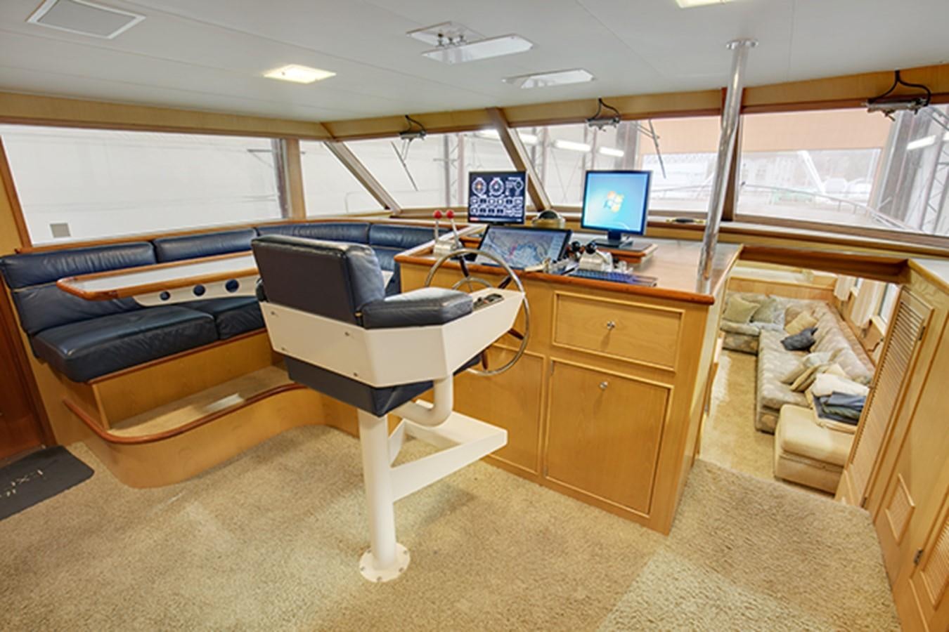 a room with a desk and a computer aboard EXCALIBUR Yacht for Sale