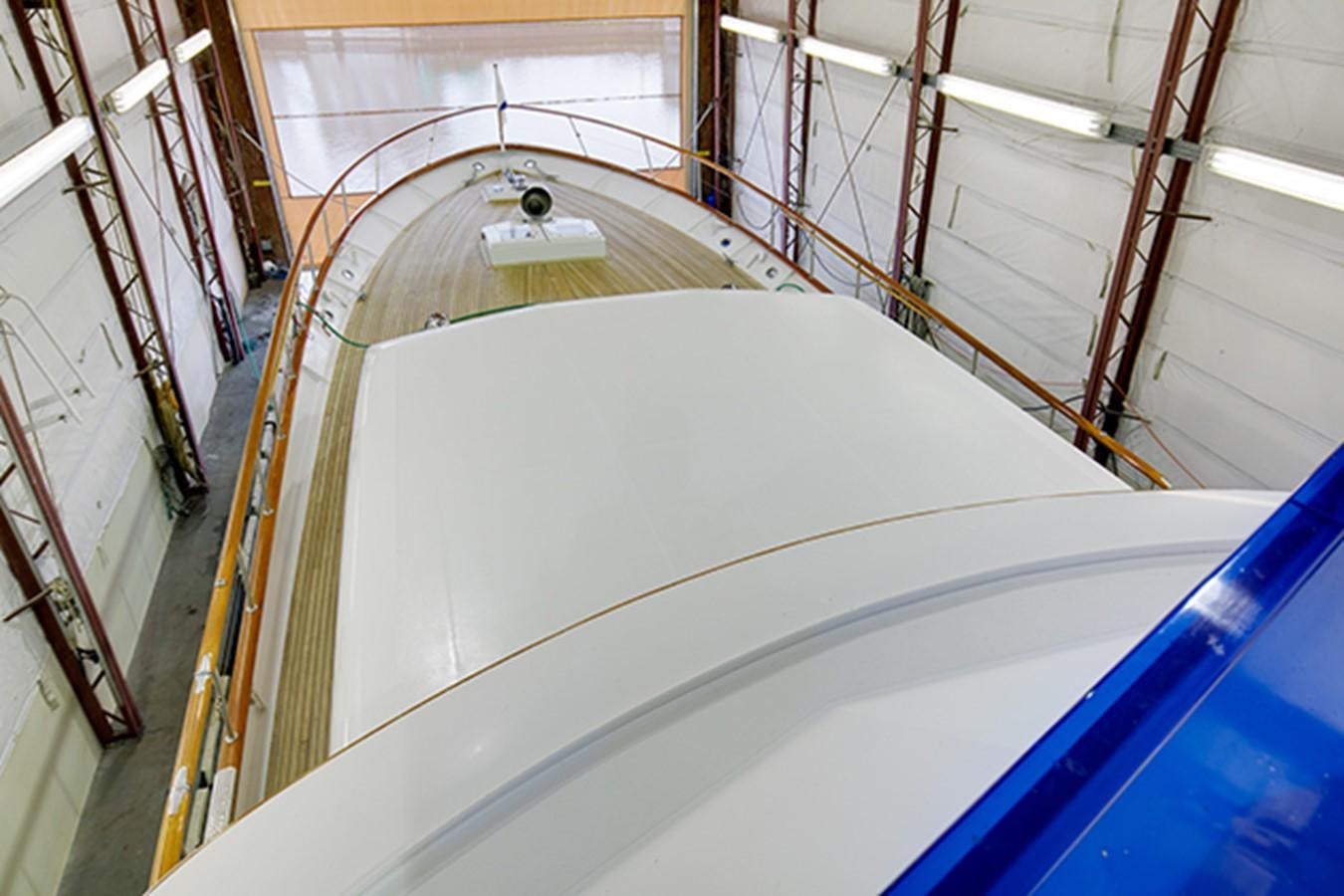 a large white room with a slide aboard EXCALIBUR Yacht for Sale