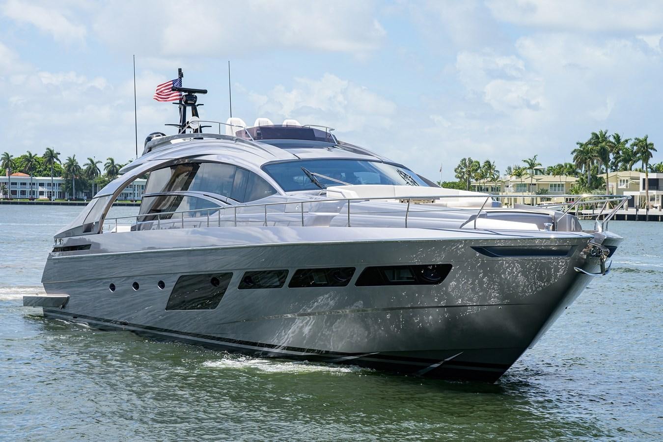 a white yacht on the water aboard ON THE MOVE Yacht for Sale