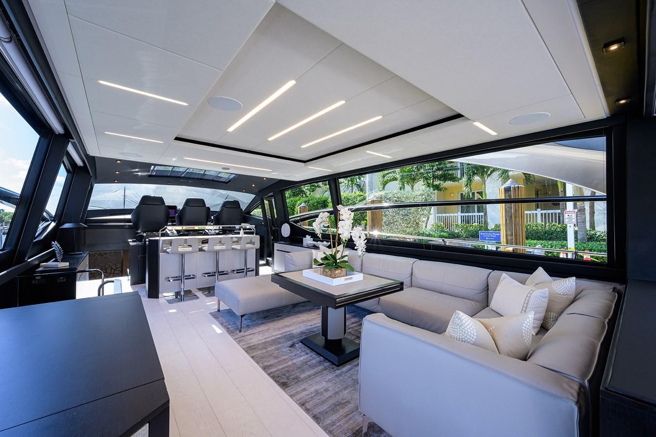 a room with a couch and a table aboard ON THE MOVE Yacht for Sale