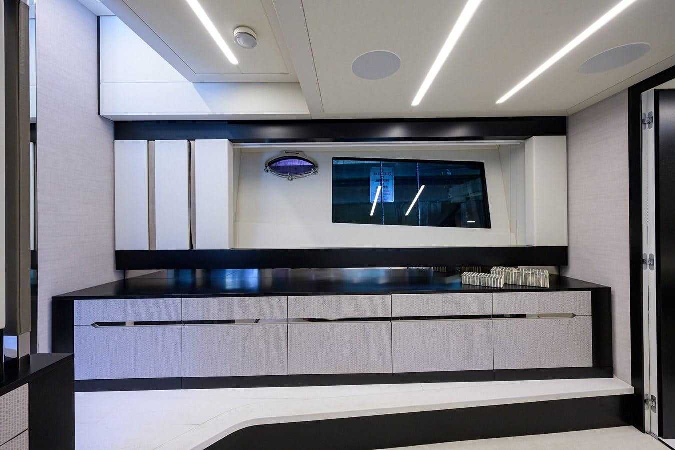 a room with a large mirror aboard ON THE MOVE Yacht for Sale