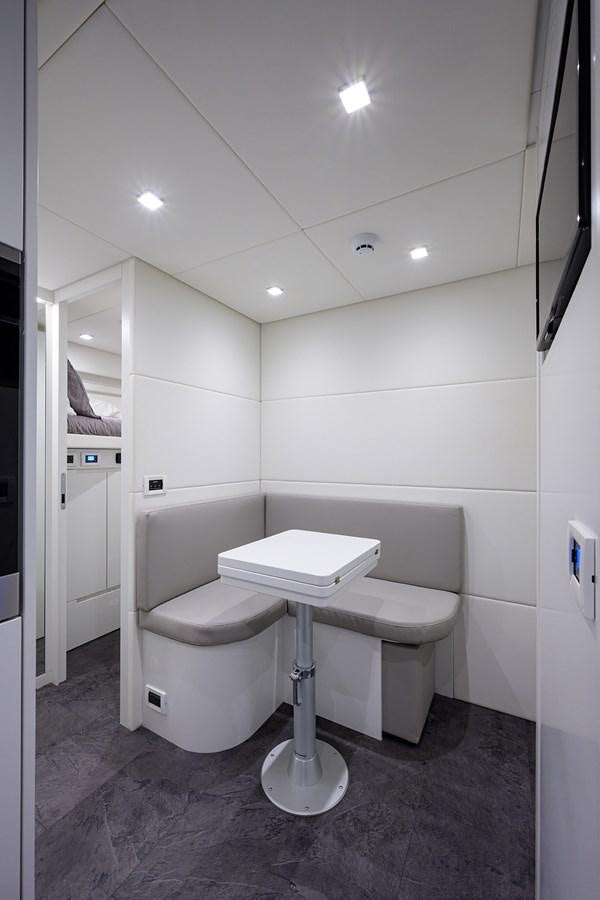 a white toilet in a bathroom aboard ON THE MOVE Yacht for Sale