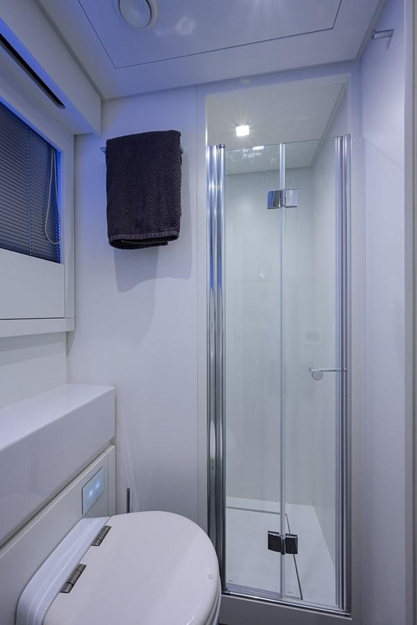 a shower unit and toilet aboard ON THE MOVE Yacht for Sale
