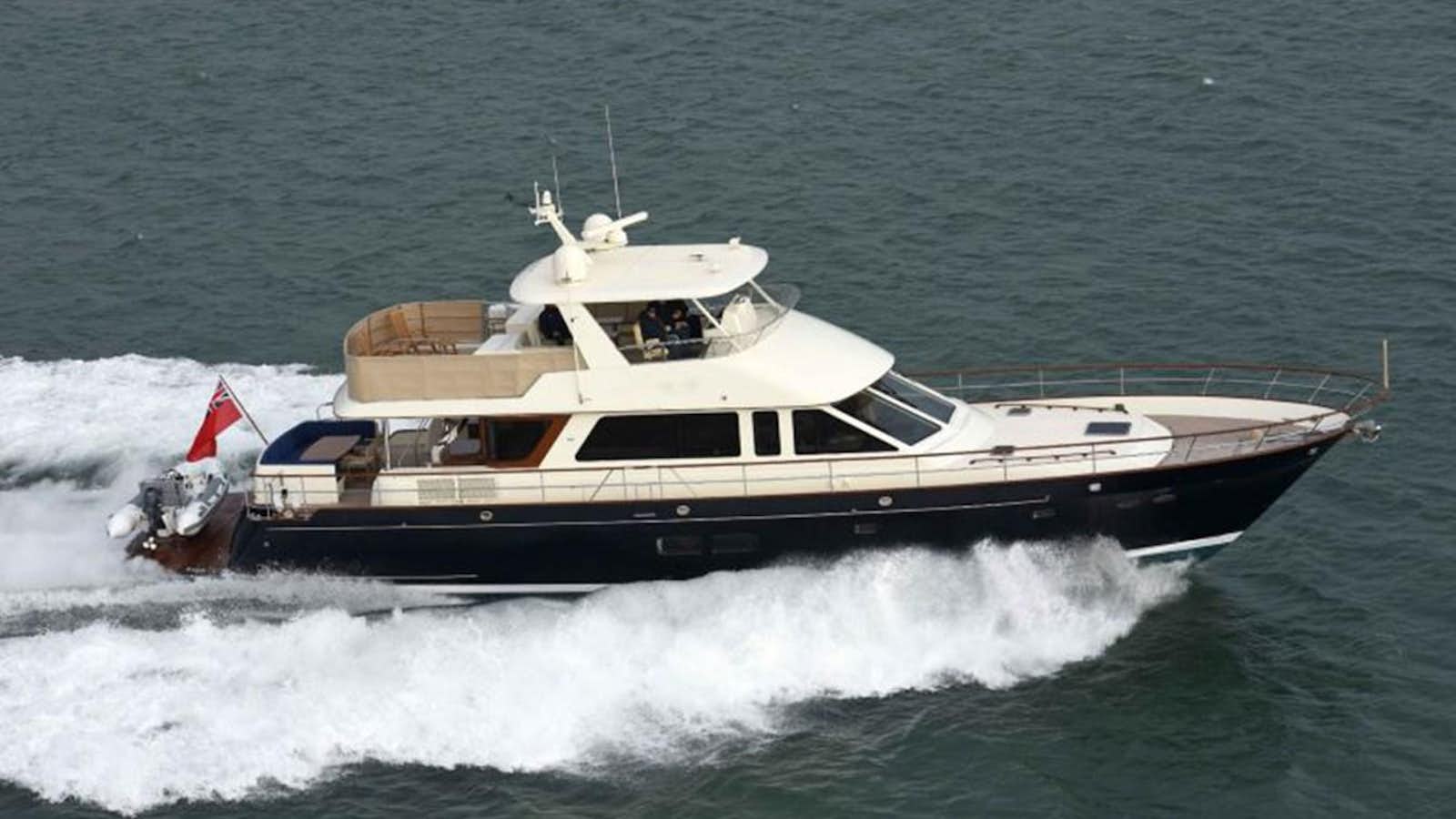a boat on the water aboard OCEAN 76 Yacht for Sale