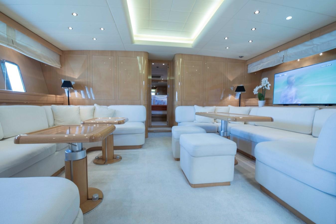 a room with a couch and a table aboard TAKE OFF Yacht for Sale