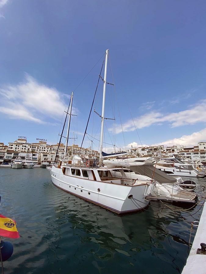 a boat in a harbor aboard COLUMBUS OF LYMINGTON Yacht for Sale
