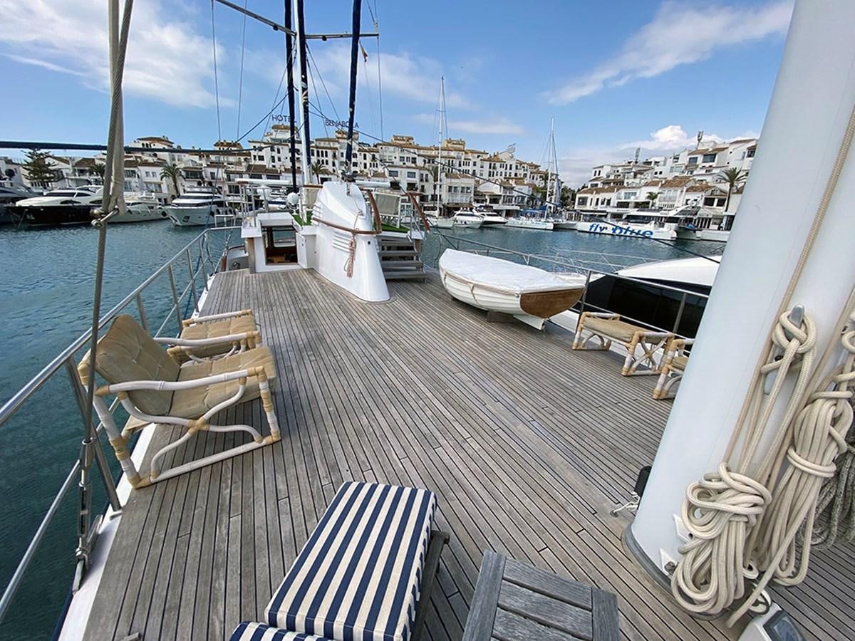 a deck with boats on it aboard COLUMBUS OF LYMINGTON Yacht for Sale