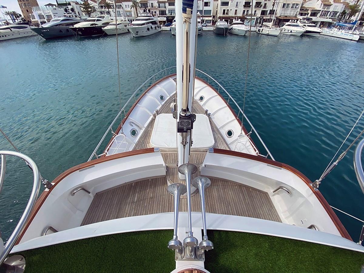 a boat in the water aboard COLUMBUS OF LYMINGTON Yacht for Sale