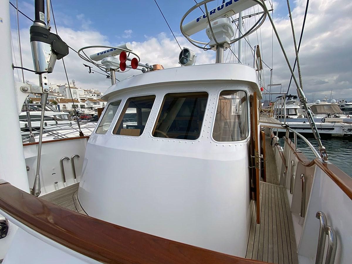 a boat in the water aboard COLUMBUS OF LYMINGTON Yacht for Sale