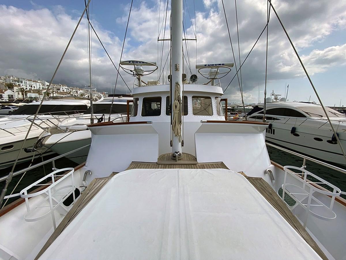 a boat in the water aboard COLUMBUS OF LYMINGTON Yacht for Sale