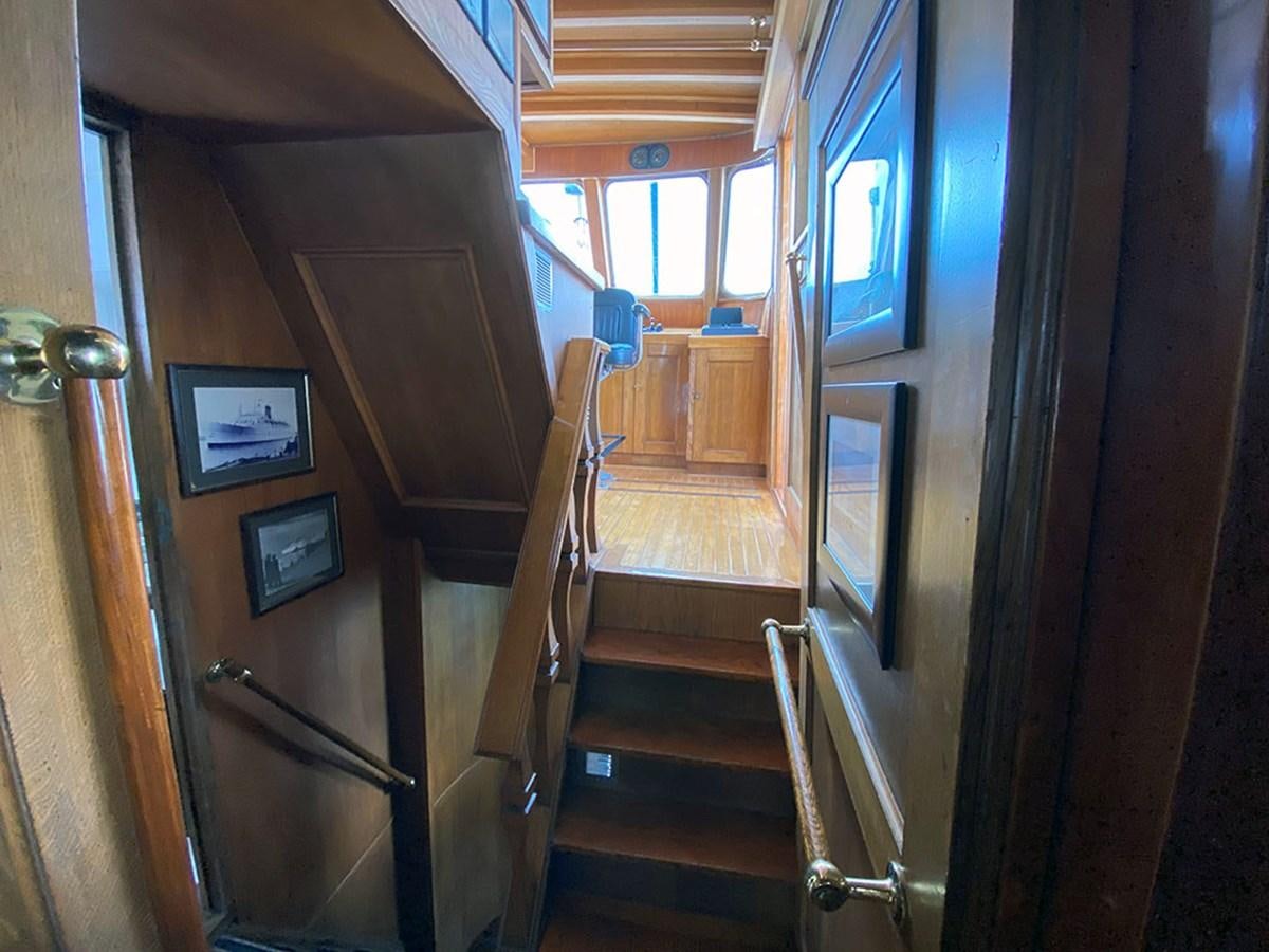 inside of a wooden cabin aboard COLUMBUS OF LYMINGTON Yacht for Sale