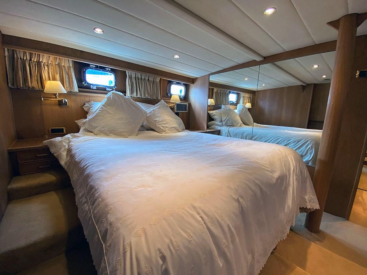 a room with two beds aboard COLUMBUS OF LYMINGTON Yacht for Sale