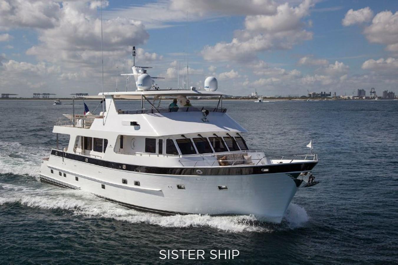 a white boat on the water aboard 820 CPMY Yacht for Sale