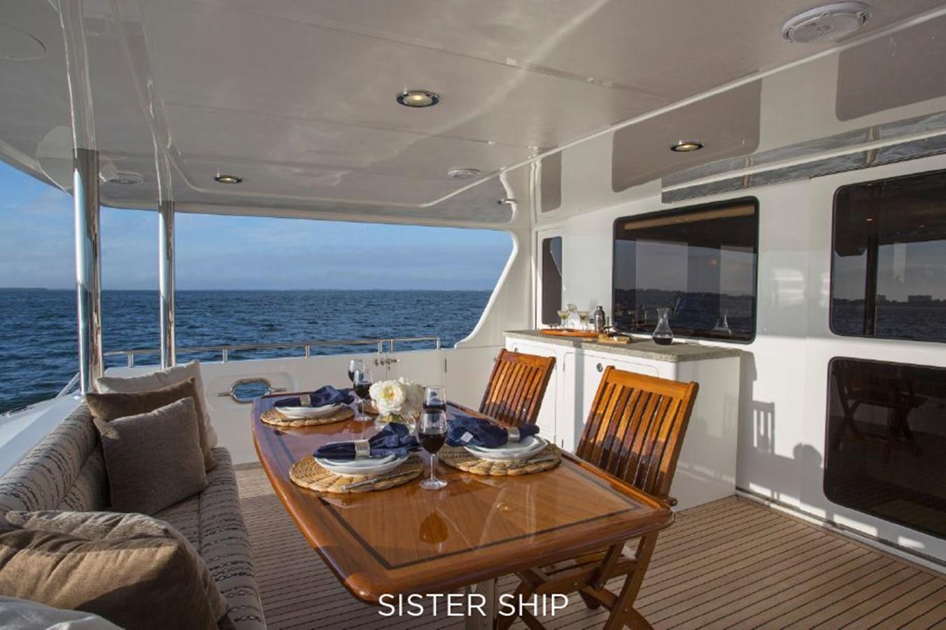 a dining table on a boat aboard 820 CPMY Yacht for Sale