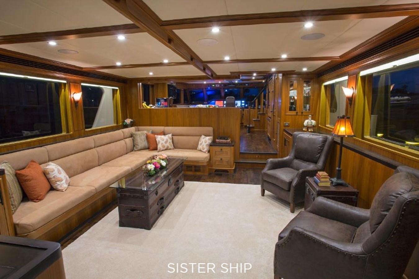 a living room with a large window aboard 820 CPMY Yacht for Sale
