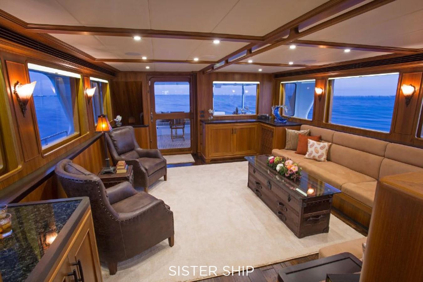 a living room with a couch and a tv aboard 820 CPMY Yacht for Sale