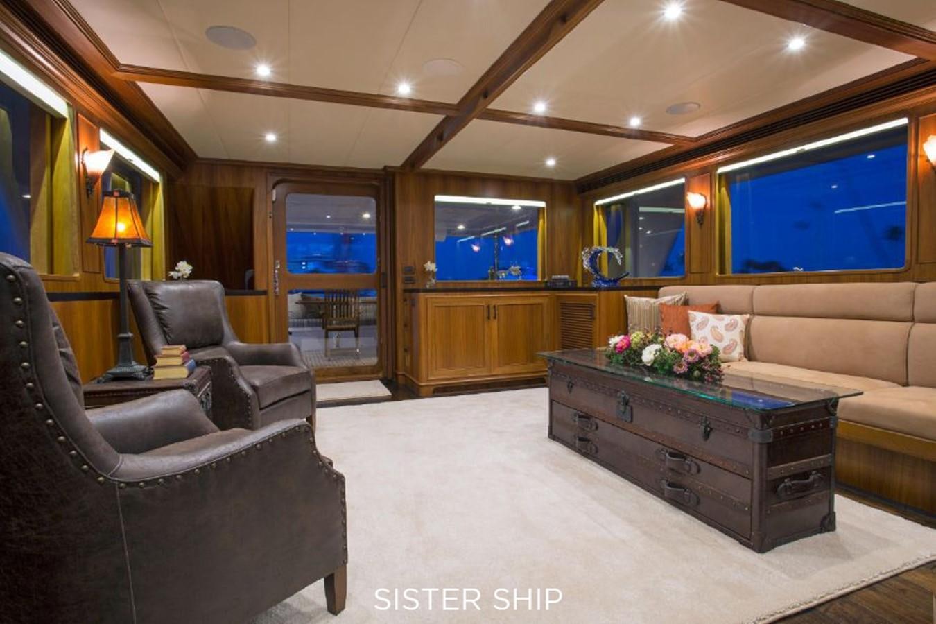 a living room with a couch and a tv aboard 820 CPMY Yacht for Sale
