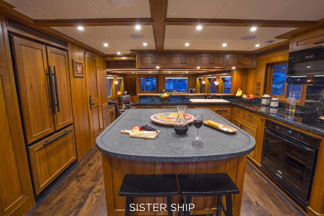 a kitchen with a marble counter top aboard 820 CPMY Yacht for Sale