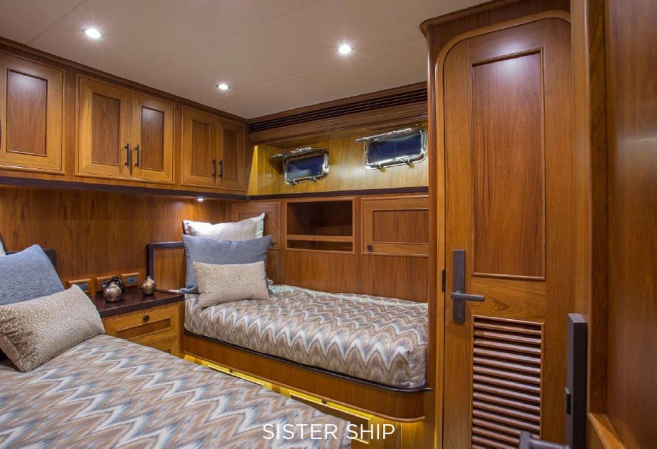 a bedroom with a bed and a closet aboard 820 CPMY Yacht for Sale