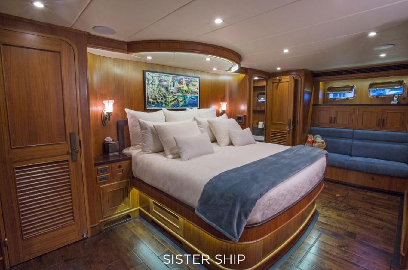 a bed in a room aboard 820 CPMY Yacht for Sale