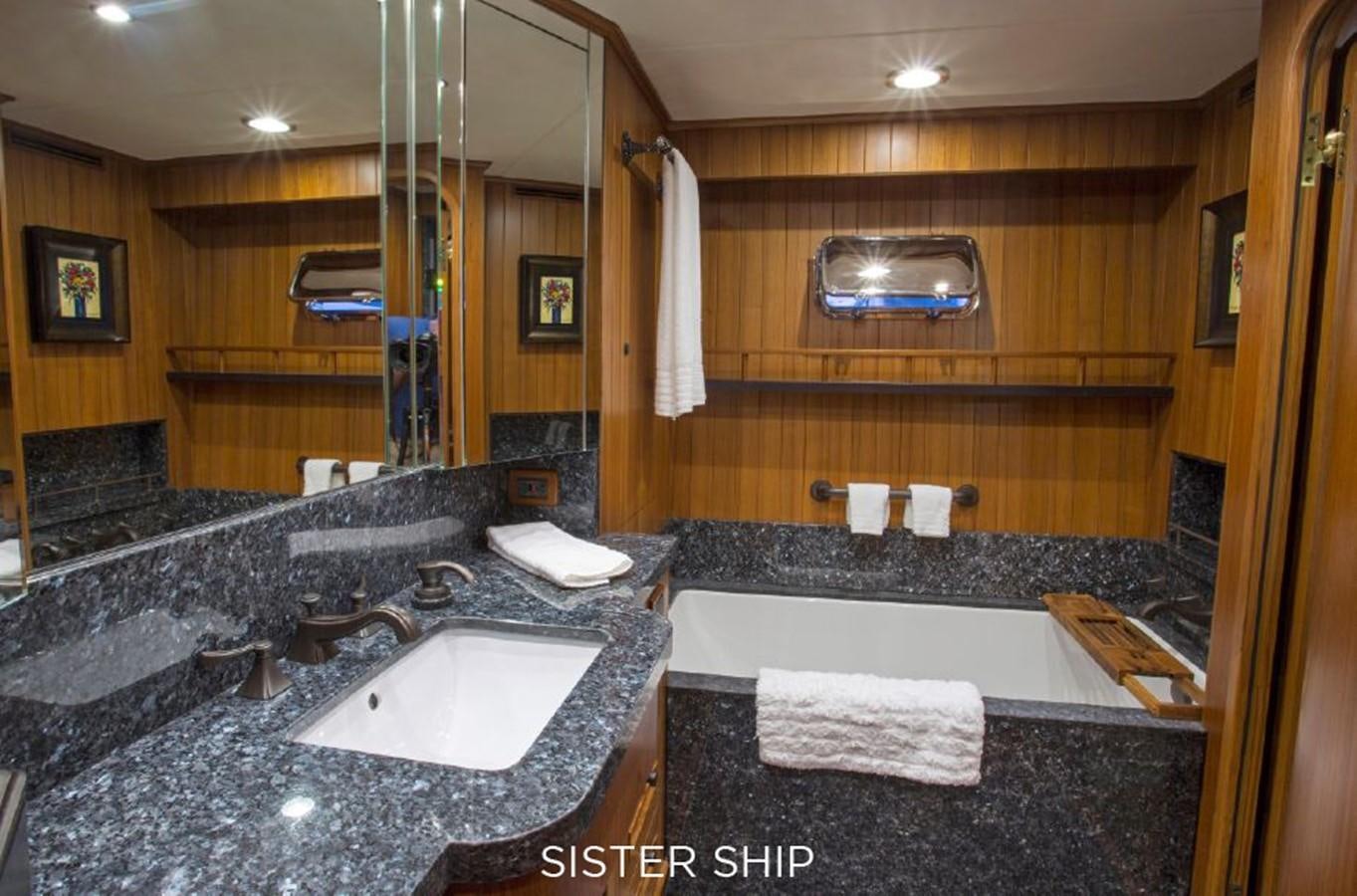 a bathroom with marble counter tops aboard 820 CPMY Yacht for Sale