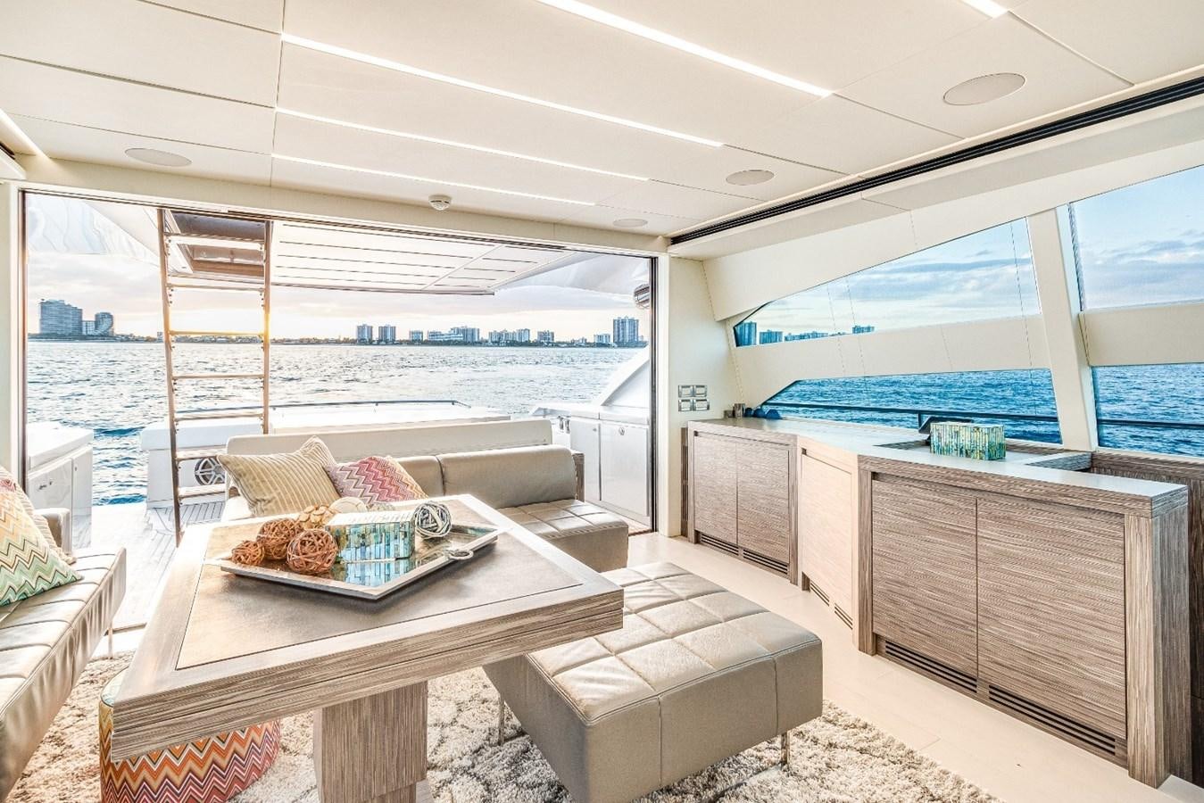 a living room with a large window aboard SIPSEY Yacht for Sale
