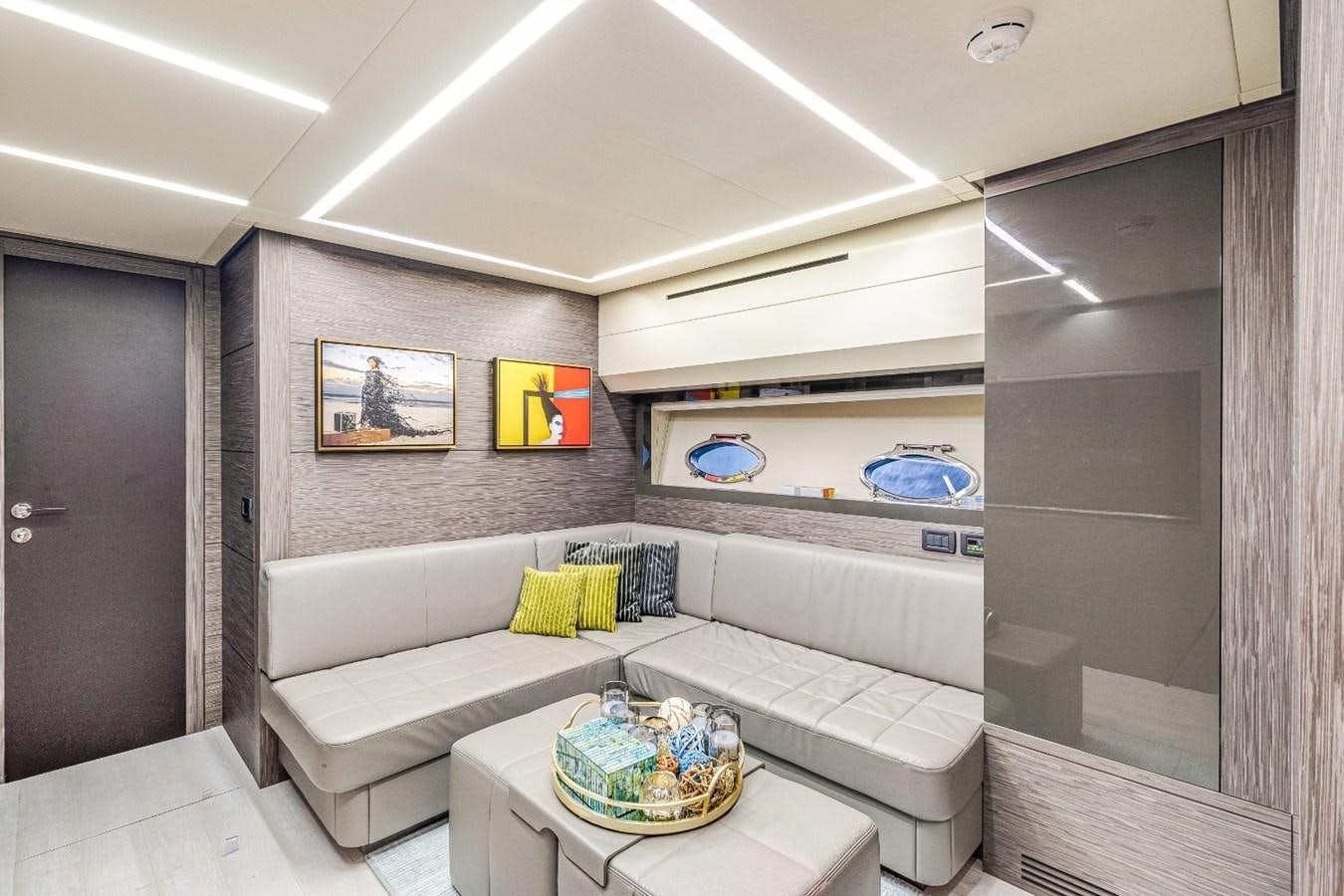 a room with a couch and a table aboard SIPSEY Yacht for Sale