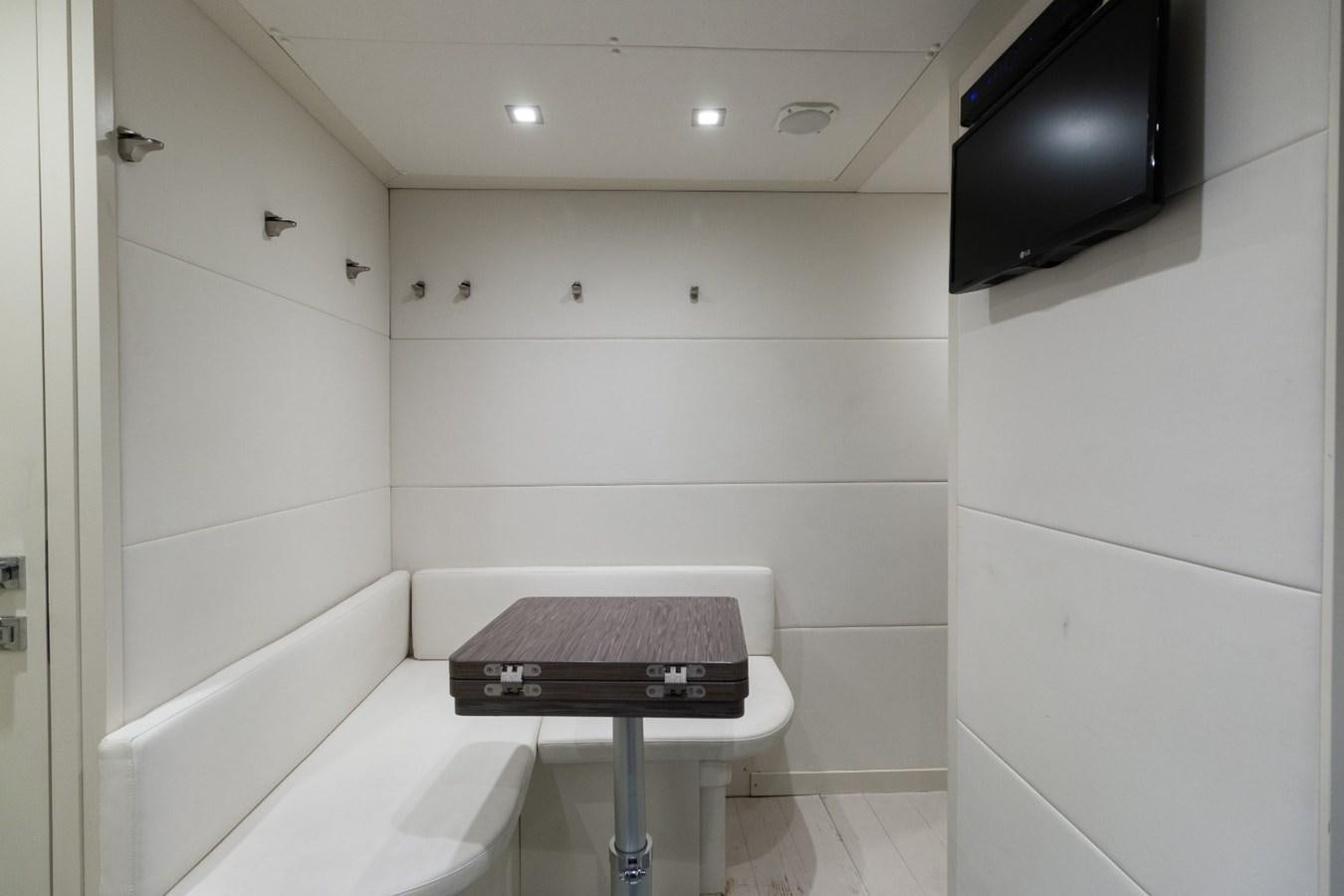 a room with a tv and a bathtub aboard SIPSEY Yacht for Sale