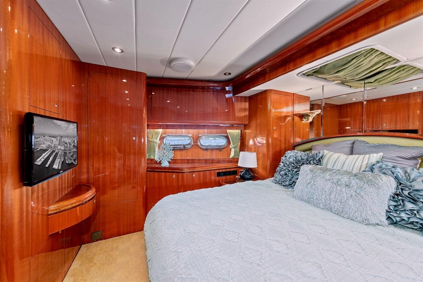 a bed with a television on it aboard PAPA'S PLACE Yacht for Sale
