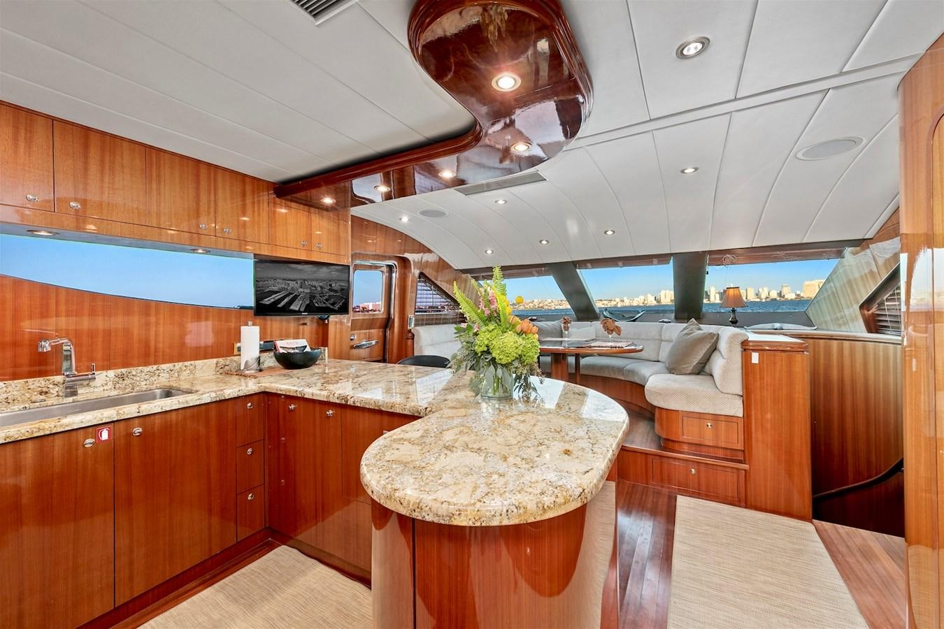 a kitchen with a large island aboard PAPA'S PLACE Yacht for Sale