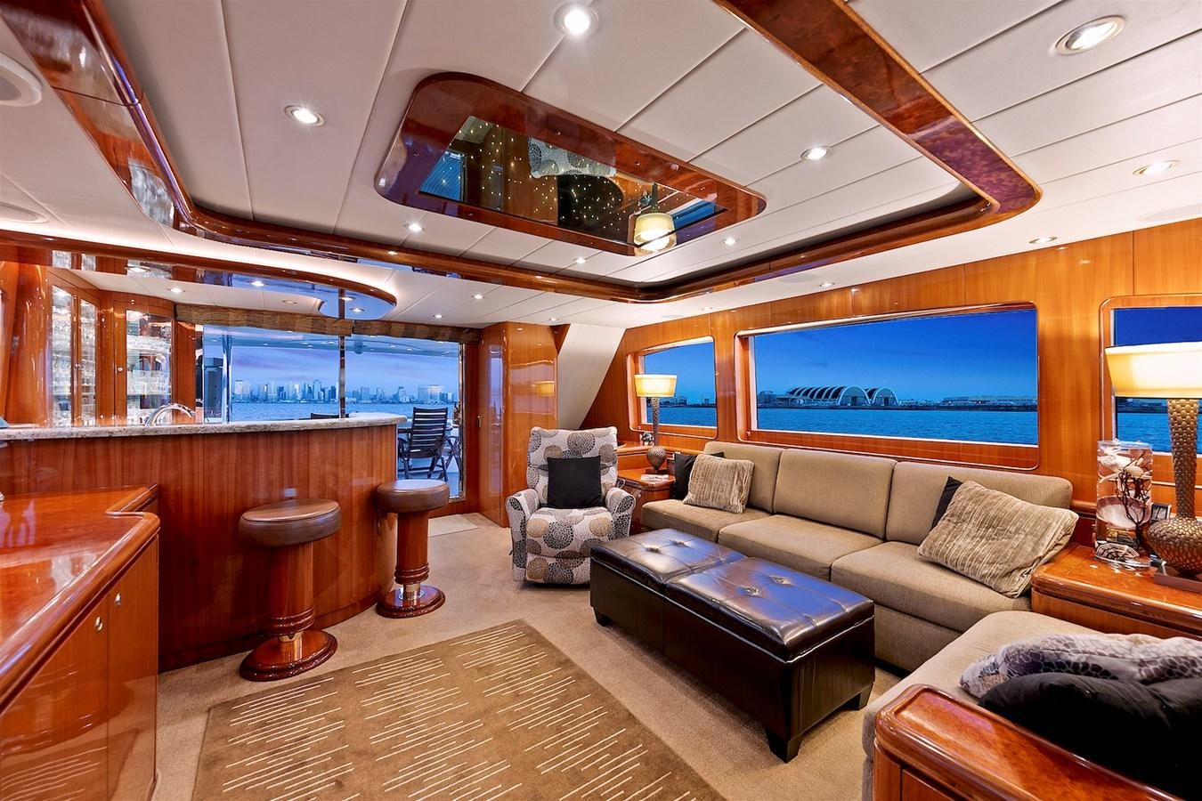 a living room with a large window aboard PAPA'S PLACE Yacht for Sale