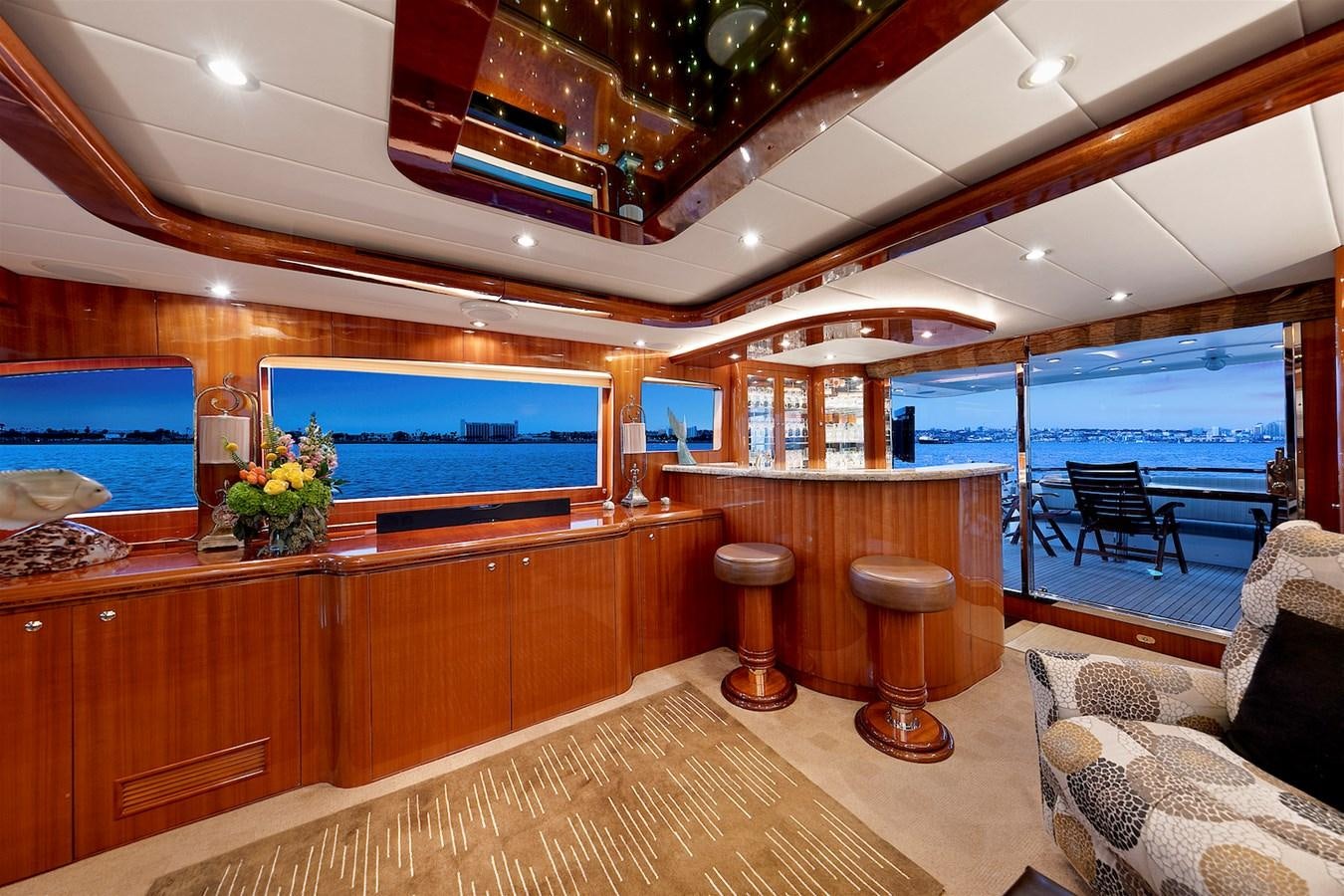 a room with a large tv aboard PAPA'S PLACE Yacht for Sale