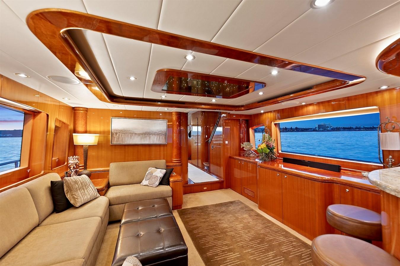 a room with a couch and a tv aboard PAPA'S PLACE Yacht for Sale