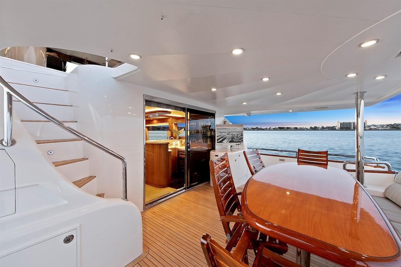 a room with a table and chairs aboard PAPA'S PLACE Yacht for Sale