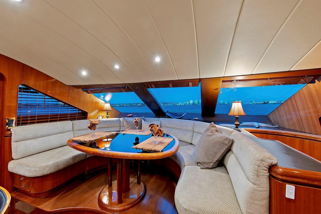 a living room with a couch and a table aboard PAPA'S PLACE Yacht for Sale