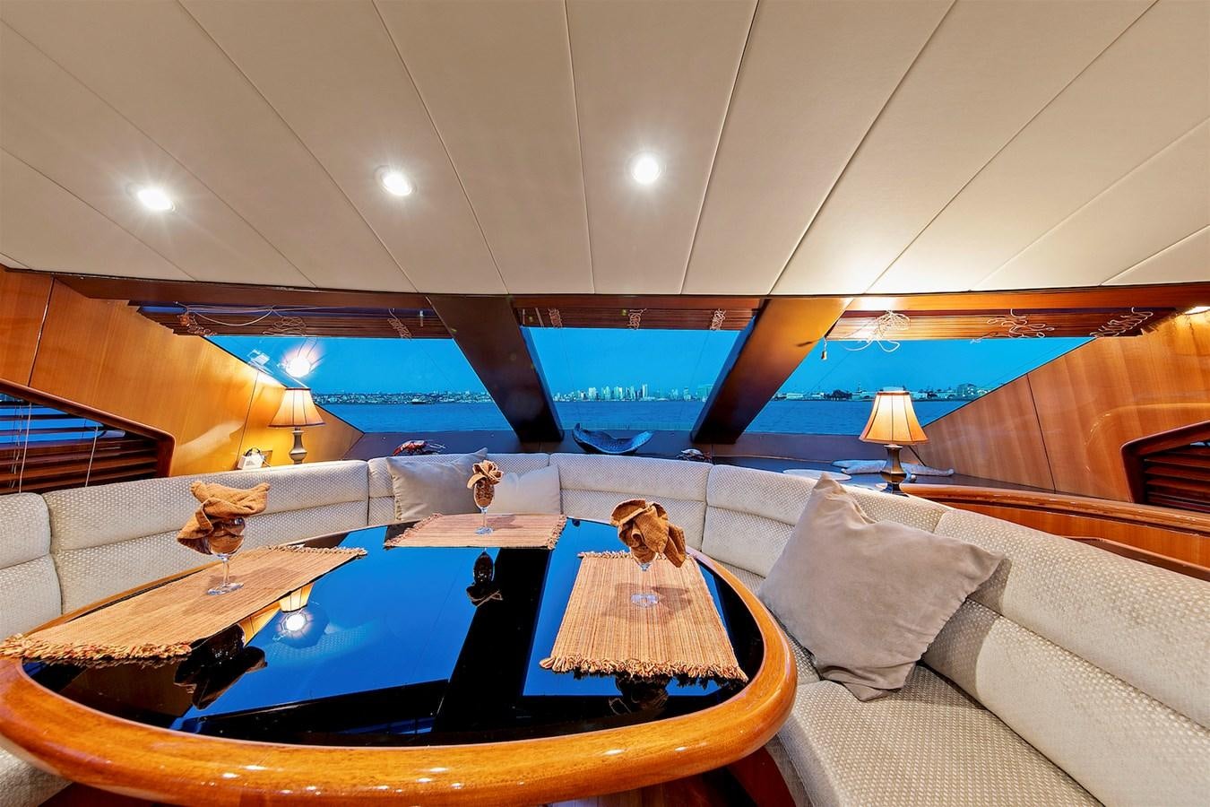 a person sitting on a bed aboard PAPA'S PLACE Yacht for Sale