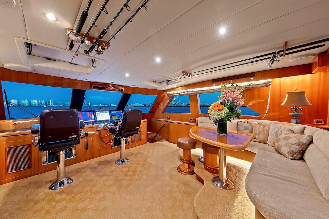 a room with a couch and a television aboard PAPA'S PLACE Yacht for Sale