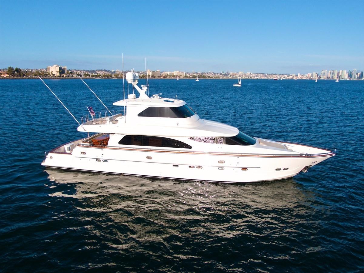 a white boat on the water aboard PAPA'S PLACE Yacht for Sale