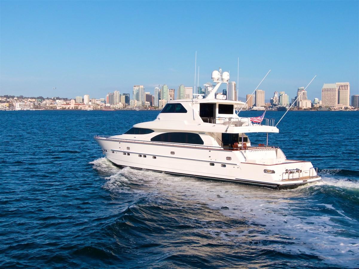 a white boat on the water aboard PAPA'S PLACE Yacht for Sale