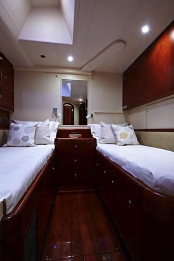 a couple of beds in a room aboard TILLYMINT Yacht for Sale