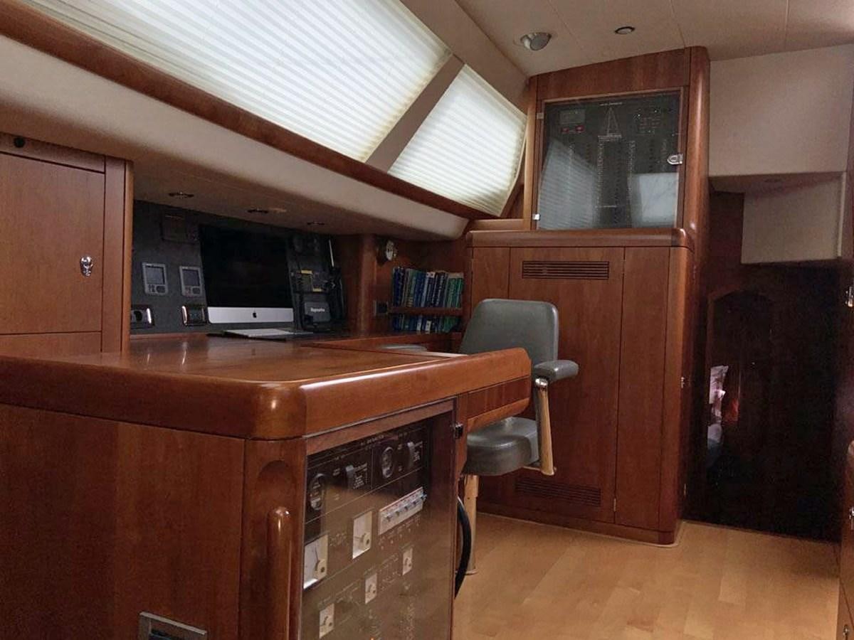 a room with a desk and computer aboard BILL AND ME Yacht for Sale