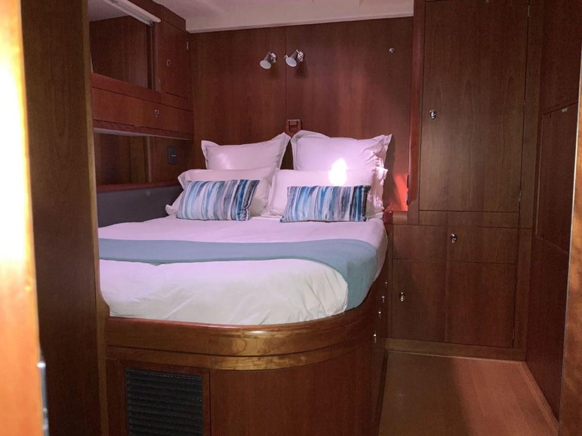 a bed in a cabin aboard BILL AND ME Yacht for Sale