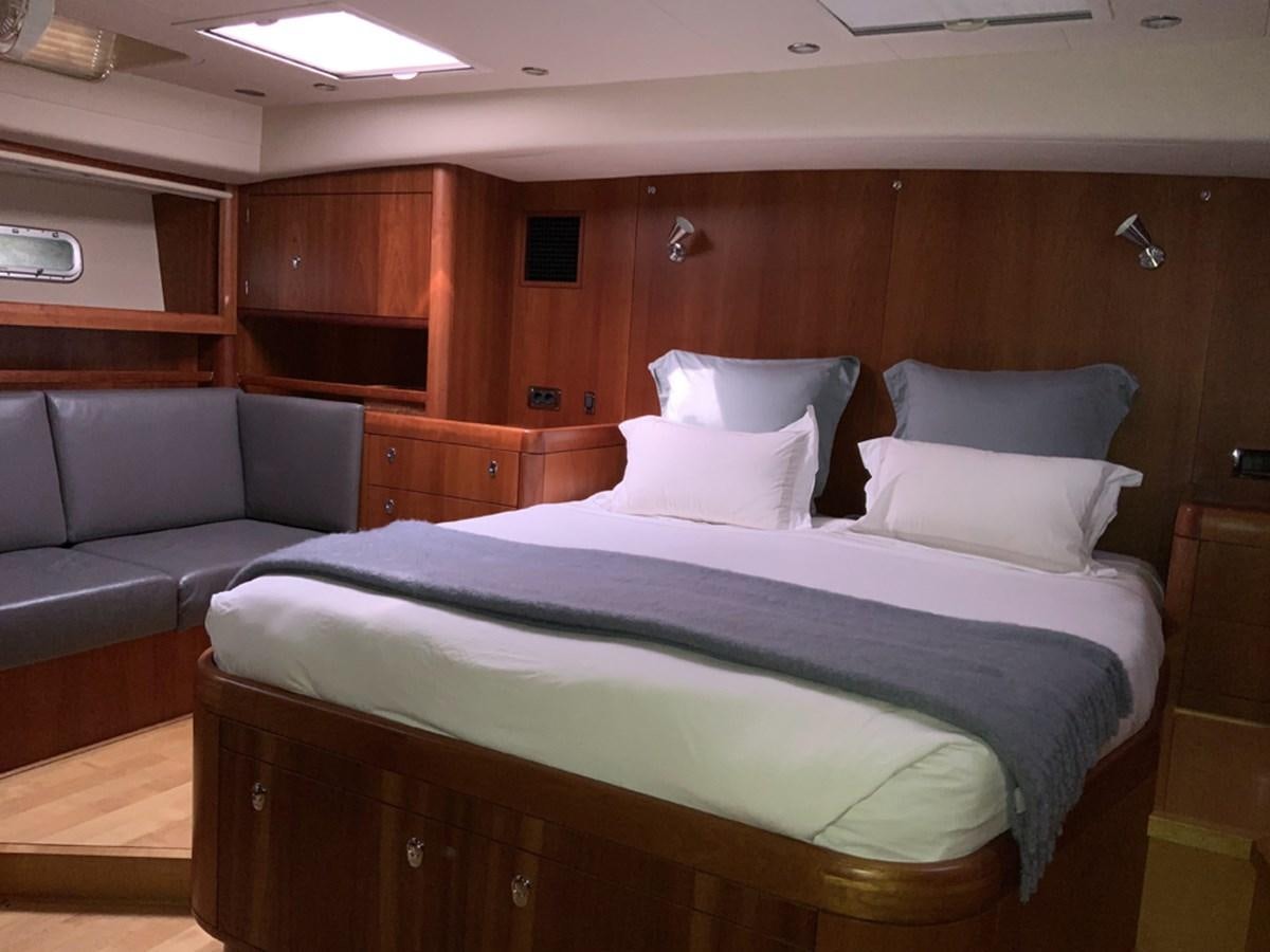 a bed in a room aboard BILL AND ME Yacht for Sale