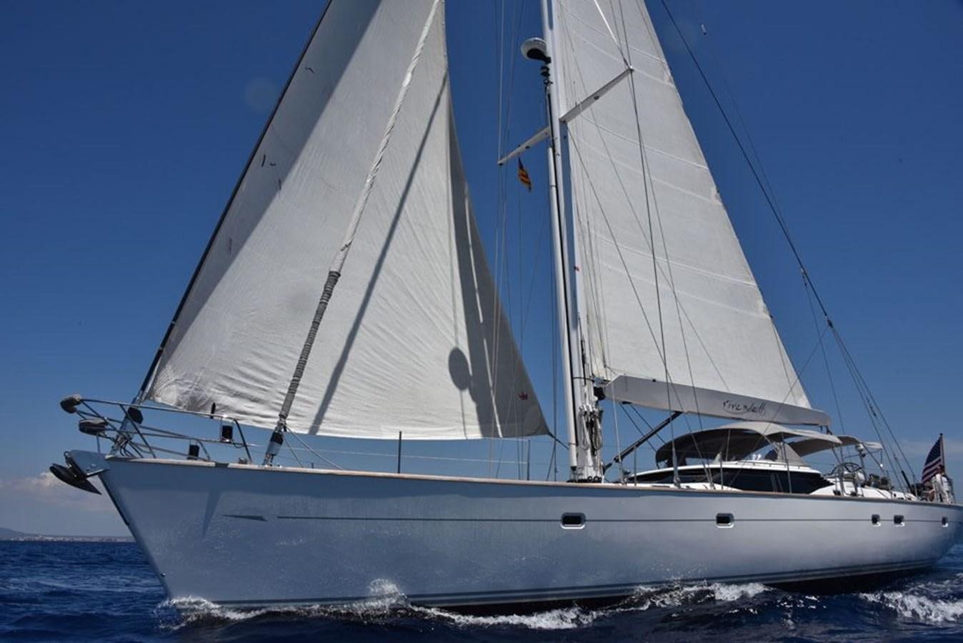 a white sailboat on the water aboard BILL AND ME Yacht for Sale