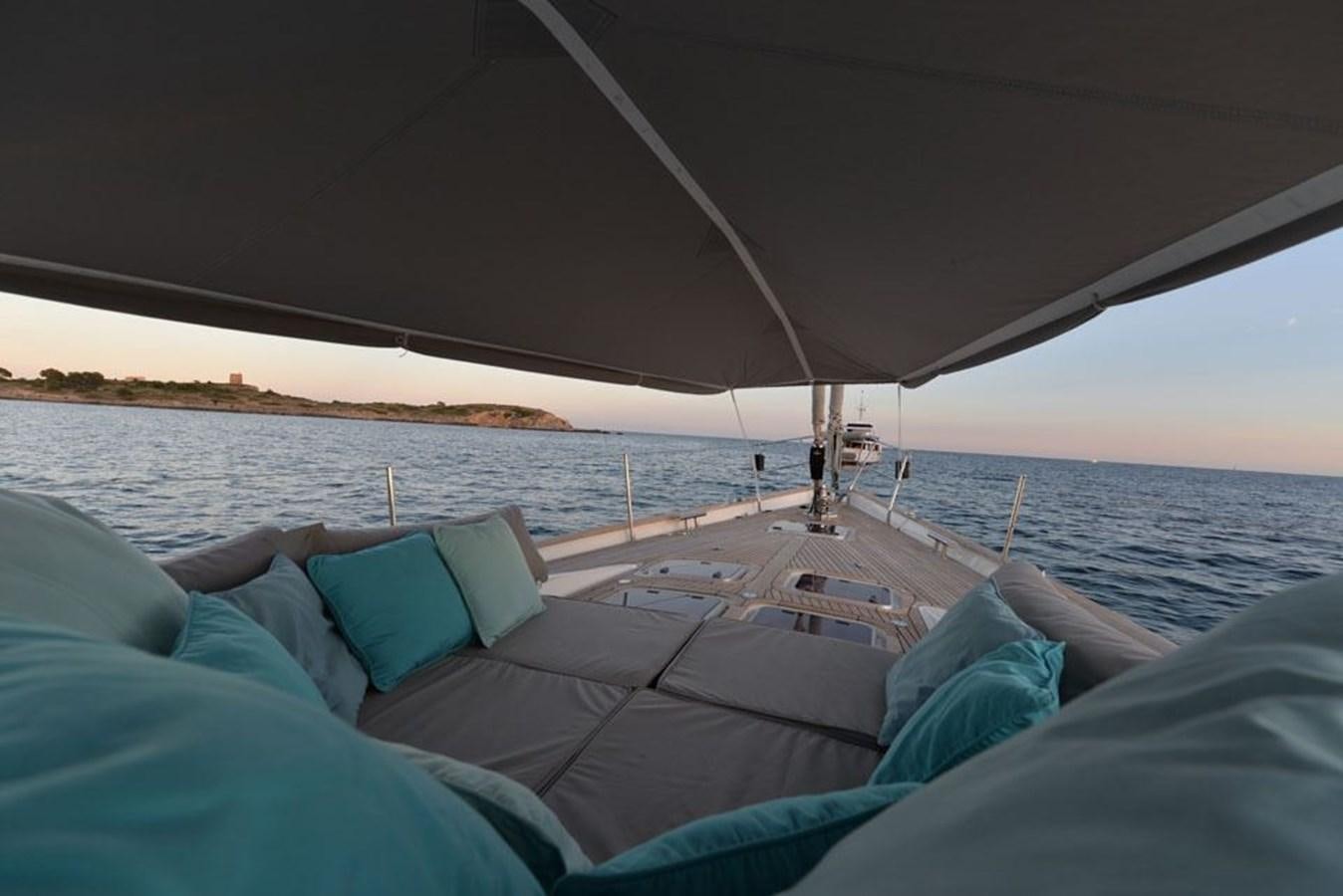 a person lying on a boat aboard BILL AND ME Yacht for Sale