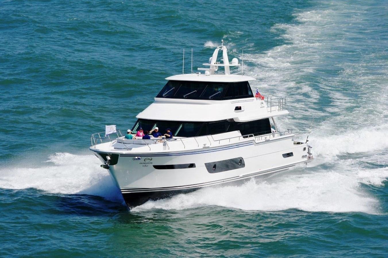 a boat with people on it aboard  V80 (NEW BOAT SPEC)  Yacht for Sale