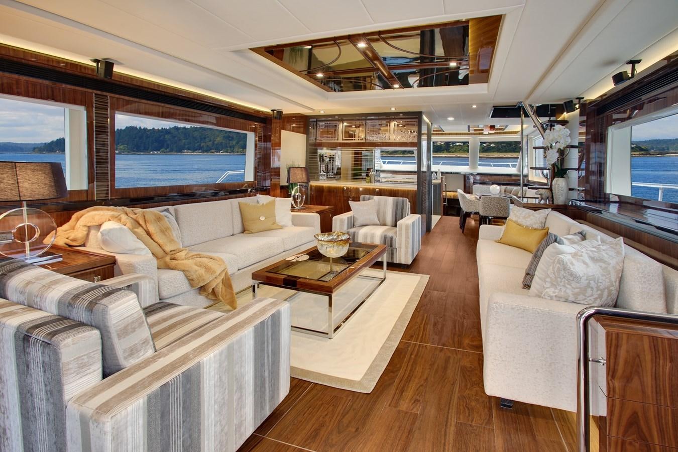 a living room with a large window aboard  V80 (NEW BOAT SPEC)  Yacht for Sale